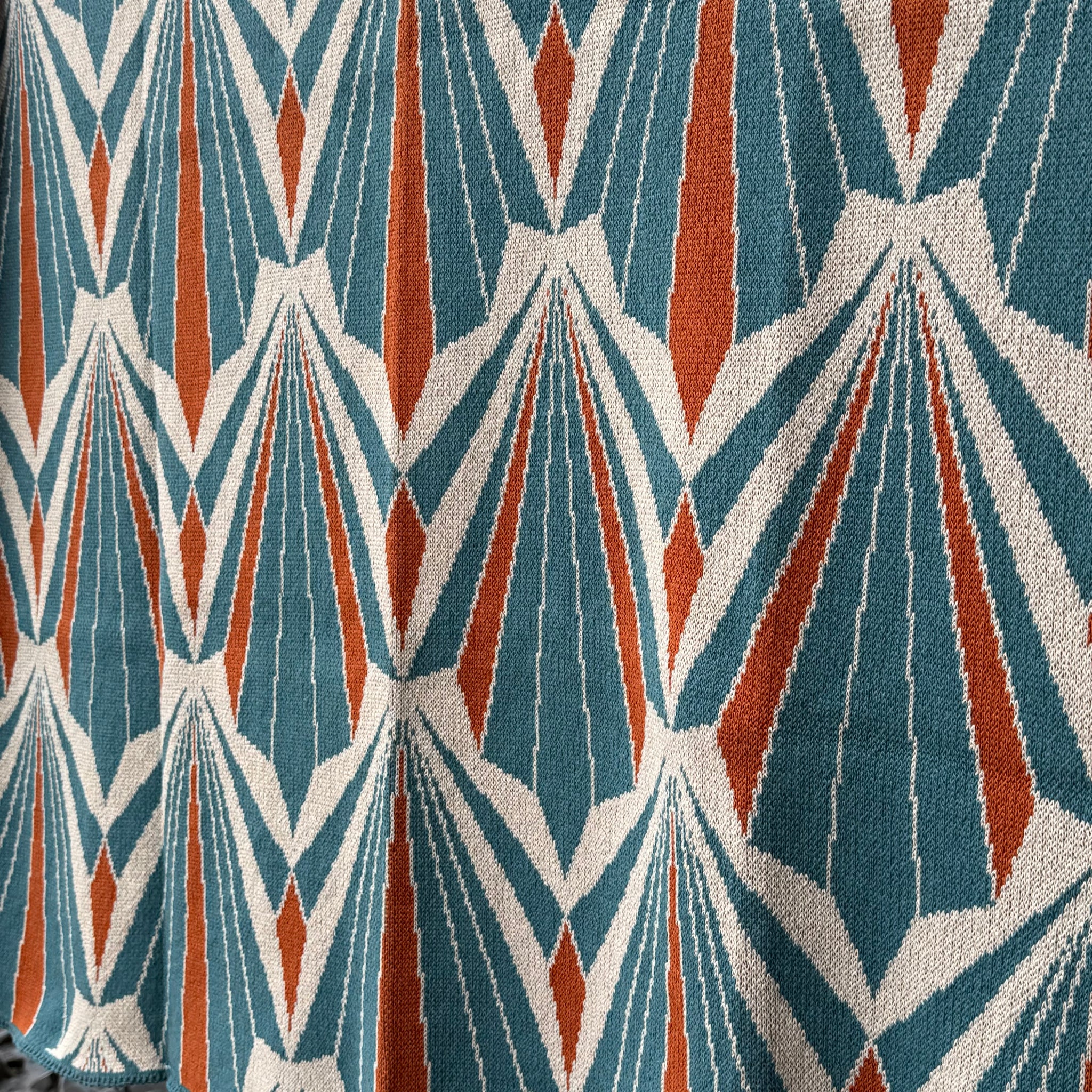 Art Deco Shells Throw in Orange by In2Green