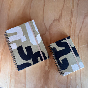 Black and Tan Notebook by Moglea