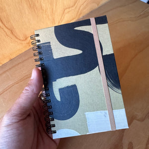 Black and Tan Notebook by Moglea