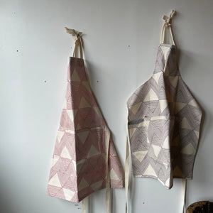 Handprinted Aprons by Olga Joan