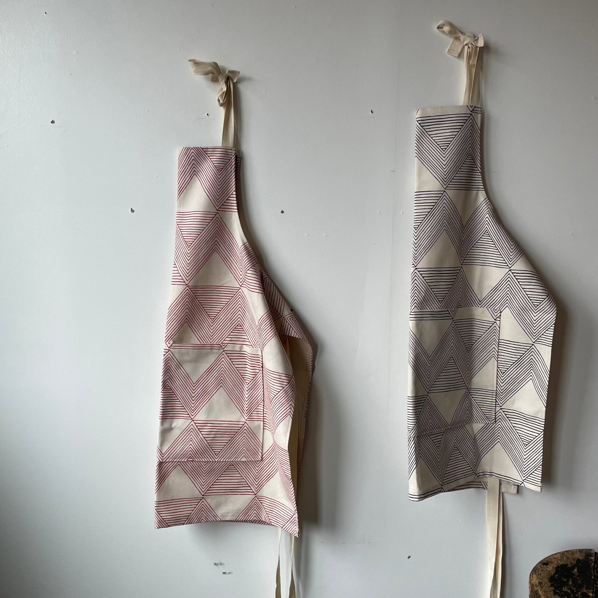 Handprinted Aprons by Olga Joan