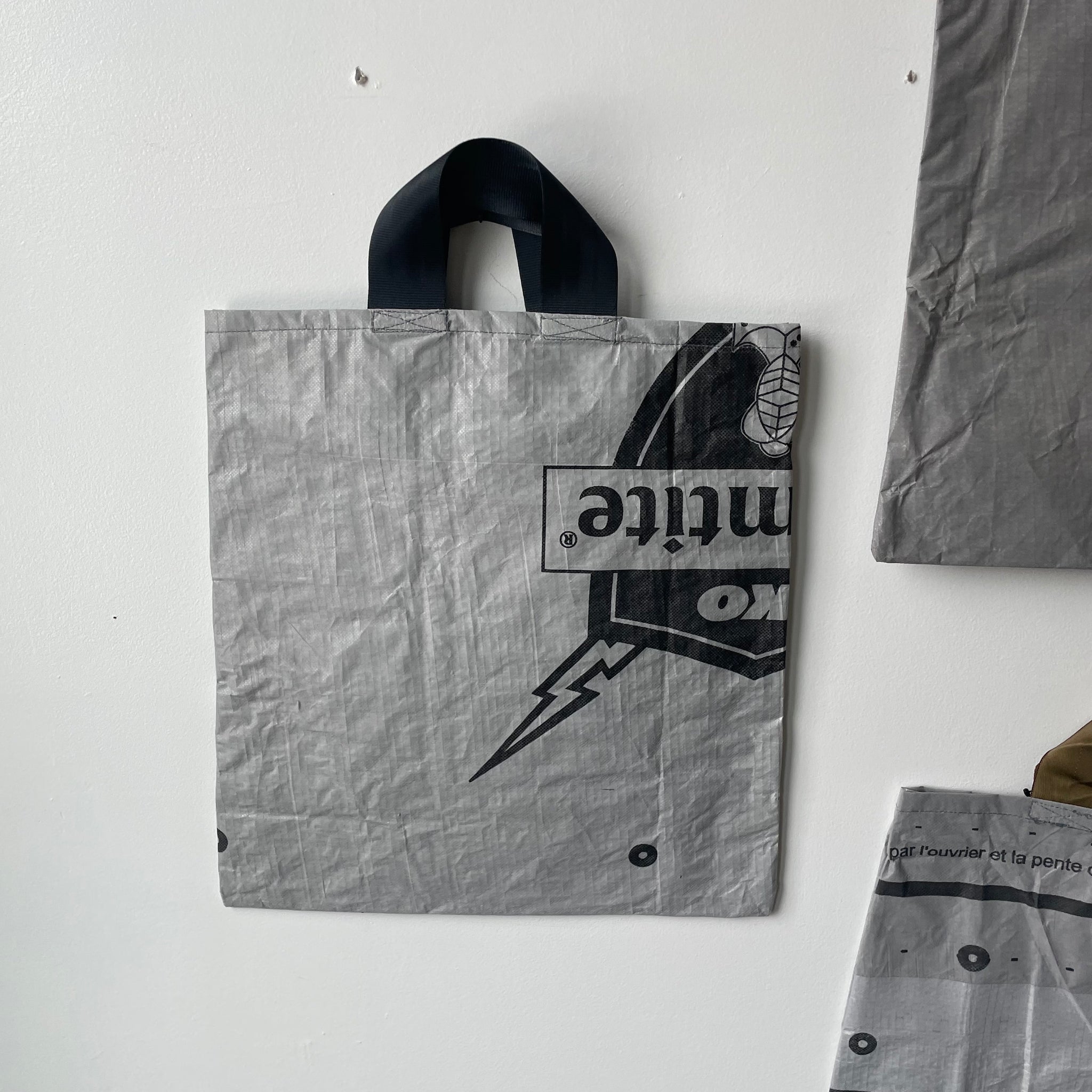 OFF-WHITE Arrows Tote Bag Black White in Polyethylene with Silver